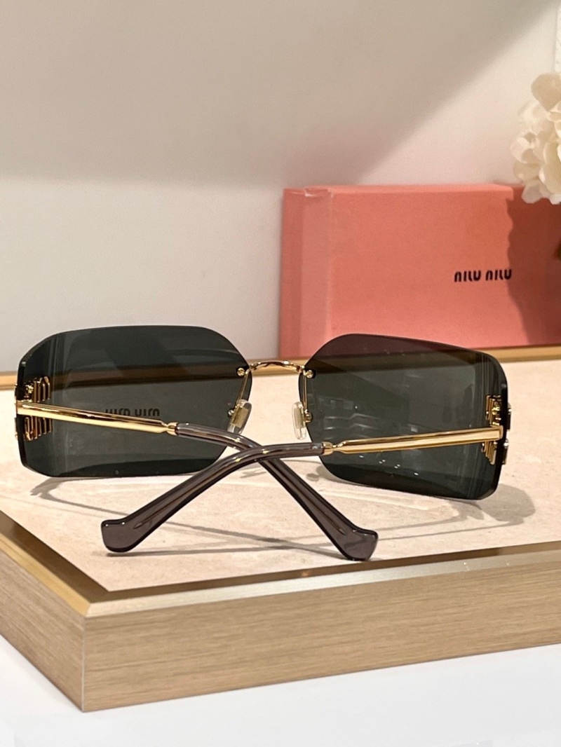 Miu miu Sunglasses